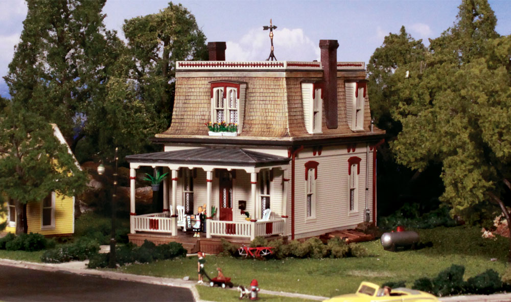 Our House - HO Scale Kit - Two-story Our House features a mansard roof with weather vane, double chimneys and a stone foundation