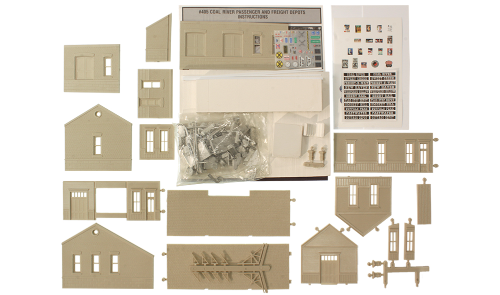 Coal River Passenger & Freight Depot - HO Scale Kit - Two building freight and passenger depot with many details including benches, freight scale, hydrocal platforms, postal box, power meter, pallet, schedule board, soda machine, light post, baggage cart, dry transfer decals, and more! See photos for footprint