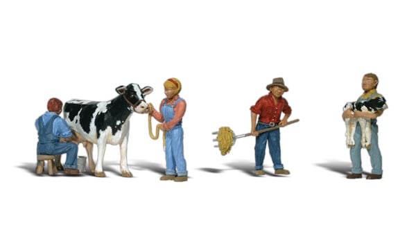 Dairy Farmers - HO Scale - A set of three men, one woman and one Holstein cow