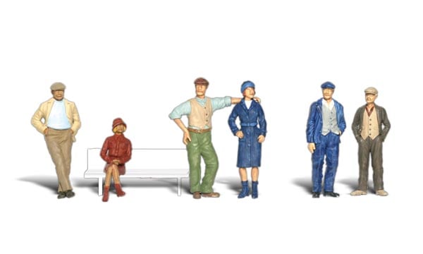 Bystanders - N scale - The men and one woman are standing and one woman is sitting