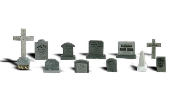 Tombstones - N scale - Eleven pieces are included in this assortment of square, rounded, cross and obelisk tombstones