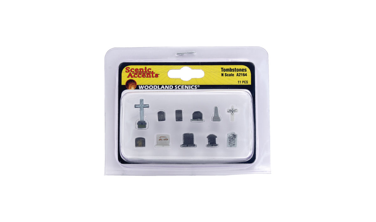 Tombstones - N scale - Eleven pieces are included in this assortment of square, rounded, cross and obelisk tombstones
