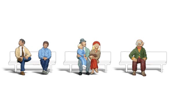 Passengers - N scale - A set of figures in sitting position - three individual men, a mother and a father and child