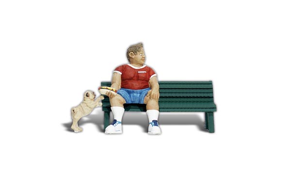 Big Bobby, Bench and Buster - G Scale - Man sits on a bench, eating a hotdog, while a little pug dog makes lunch plans of his own