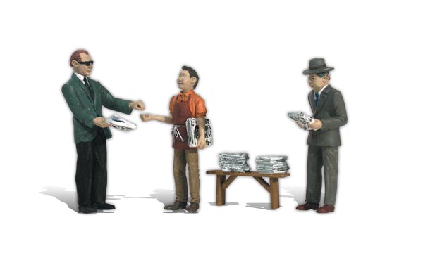 Ned's Newsstand - G Scale - A paperboy sells papers to two male customers from his wooden bench