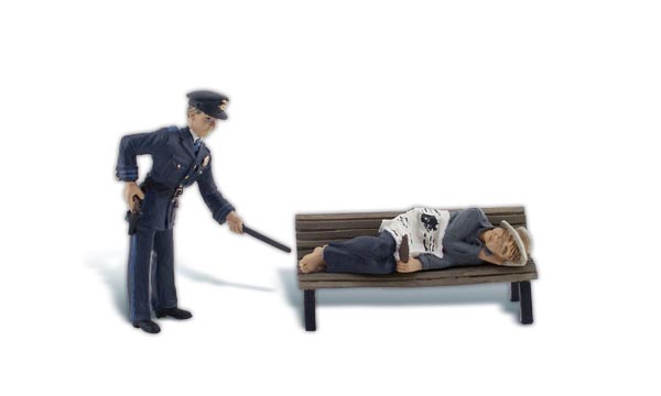 Law and Lawless - G Scale - A cop nudges a sleepy homeless man
