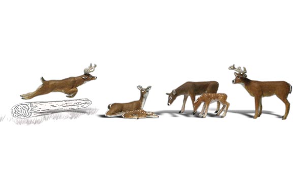Deer - O Scale - A mighty buck is stretched in a full running jump, a doe sits by her fawn, while another doe and fawn graze, as a buck stands guard