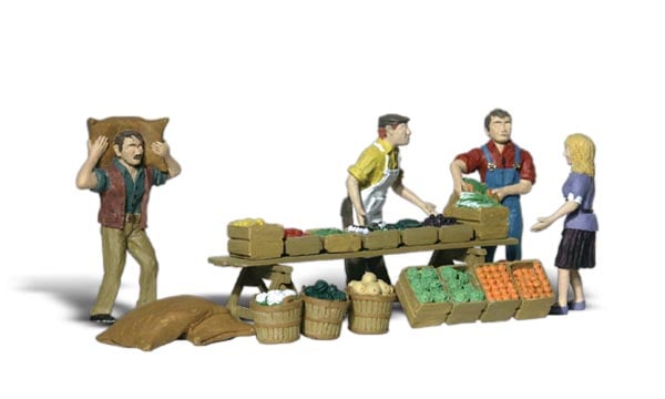 Farmers Market - O Scale - A Farmer hefts a sack of potatoes over his shoulders, apples, carrots, lettuce, tomatoes and more