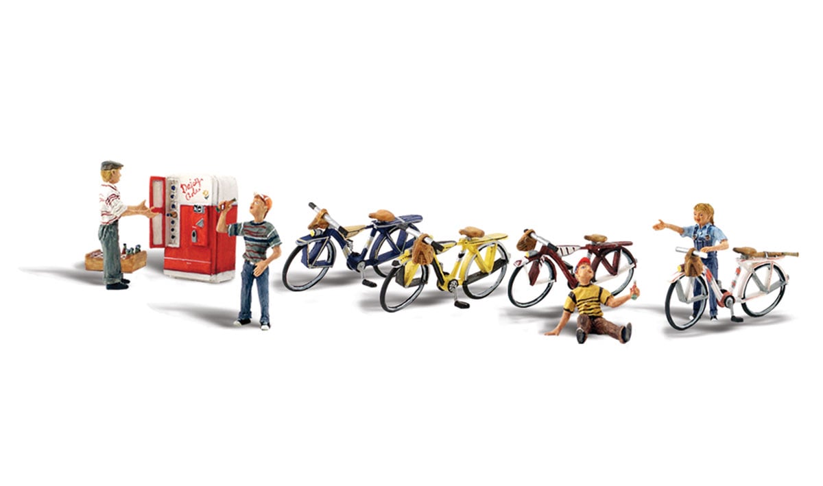 Bicycle Buddies - O Scale - A set of four kids, with their bikes, take a break at the old pop machine