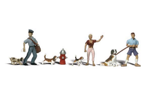 People & Pets - O scale - This set includes a mailman, a man and a woman in various 'canine' situations, four dogs and a fire hydrant