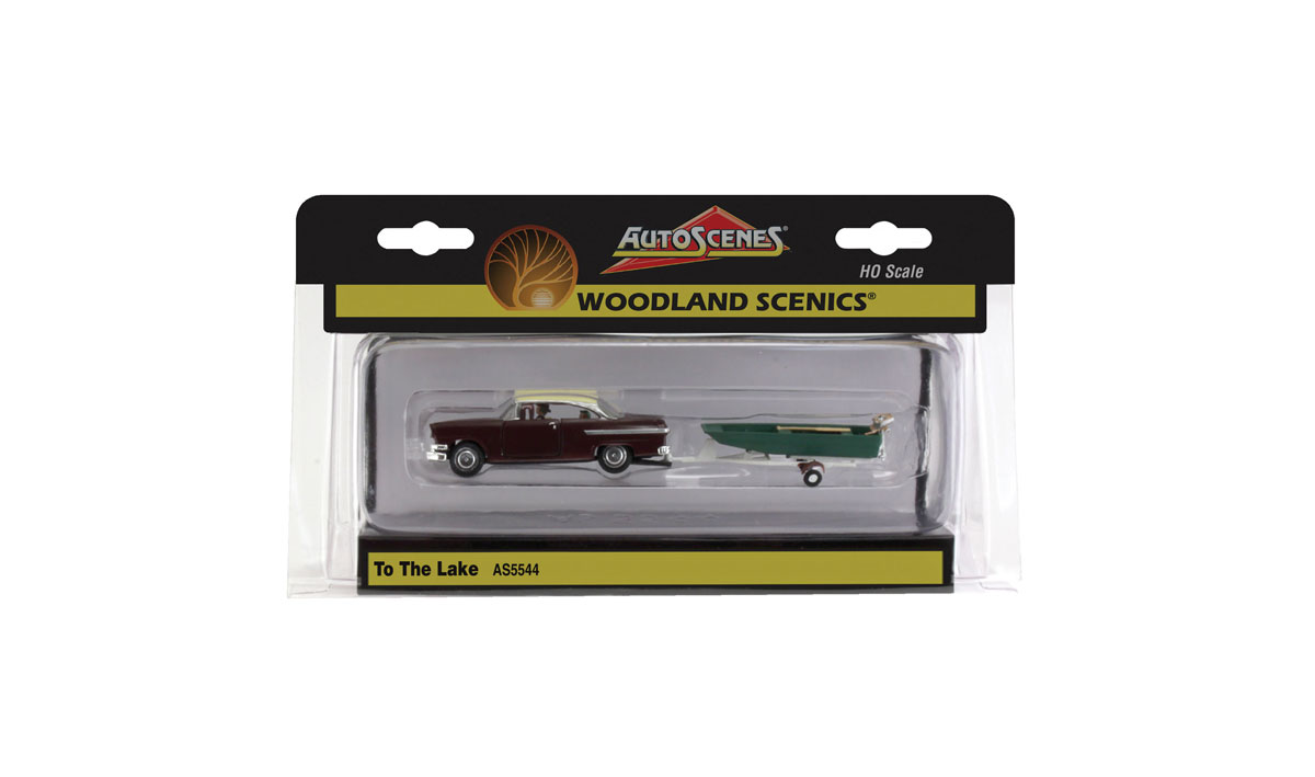 To the Lake - HO Scale - Lake-goers are loaded up, ready to go with their boat and vintage outboard motor in tow