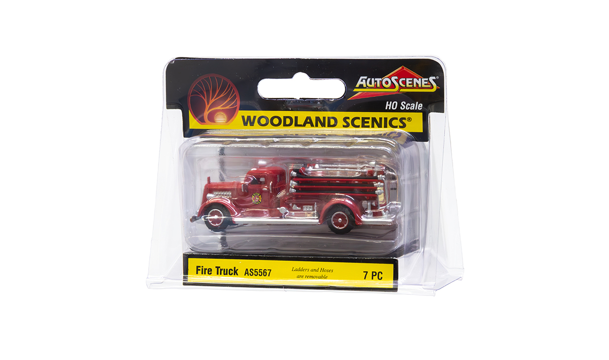 Fire Truck - HO Scale - Where's the fire? This vintage '50s era fire engine has three removable fire hoses, three ladders and various other intricate, realistic details