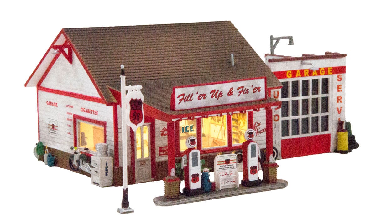 Fill'er Up & Fix'er - N Scale - Layout residents can savor a Yoo-hoo or a sody-pop while waiting for the mechanic to change the oil and fix a tire