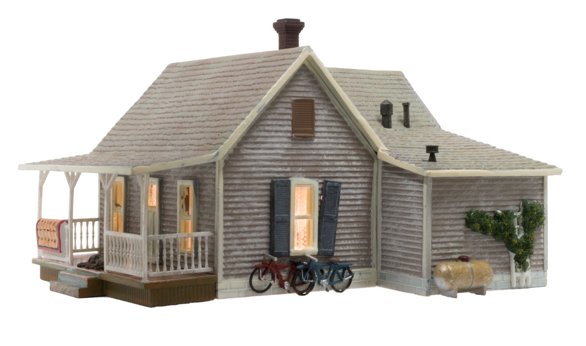 Old Homestead - N Scale - The Old Homestead is a bit rough around the edges and the perfect representation of an old rural bungalow, beautifully weathered and loaded with detail