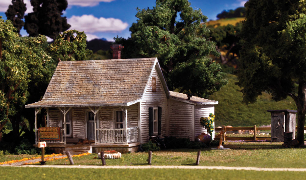 Old Homestead - N Scale - The Old Homestead is a bit rough around the edges and the perfect representation of an old rural bungalow, beautifully weathered and loaded with detail
