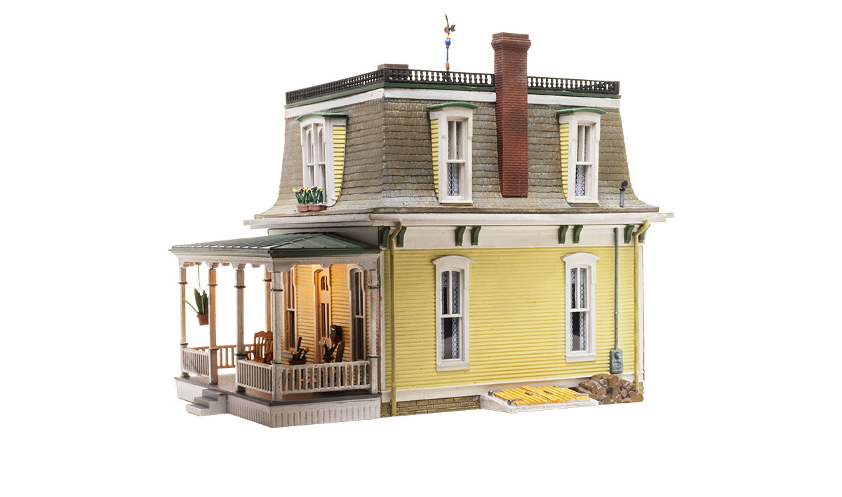 Home Sweet Home - N Scale - This Home Sweet Home features classic Victorian architecture housed under a characteristic Mansard roof, a vintage weather vane, and intricately styled dormers complete with flowered window boxes
