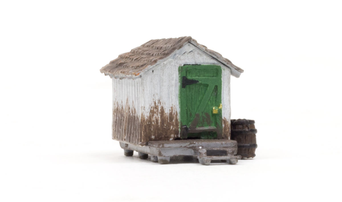 Wood Shack - N Scale - The bright green door is a little rugged now and the wood paneled walls could use a good wash, but it is still as secure as the day it was built