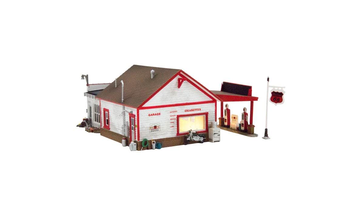 Fill'er Up & Fix'er - HO Scale - Layout residents can savor a Yoo-hoo or a sody-pop while waiting for the mechanic to change the oil and fix a tire