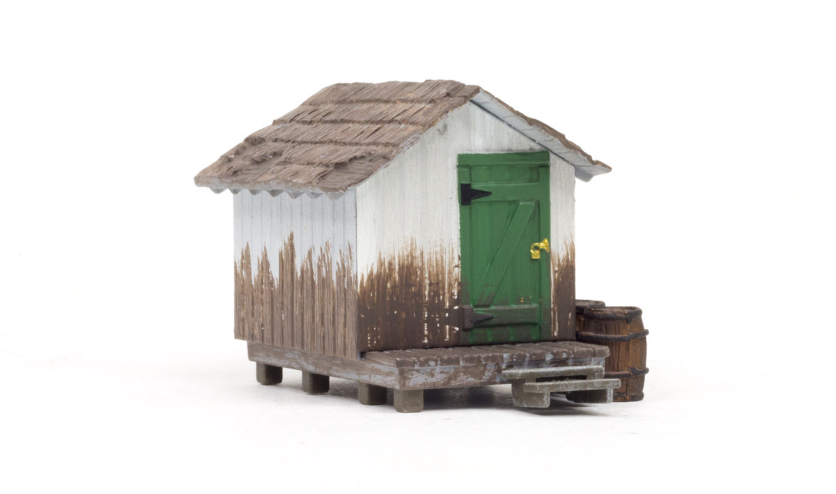 Wood Shack - HO Scale - The bright green door is a little rugged now and the wood paneled walls could use a good wash, but it is still as secure as the day it was built