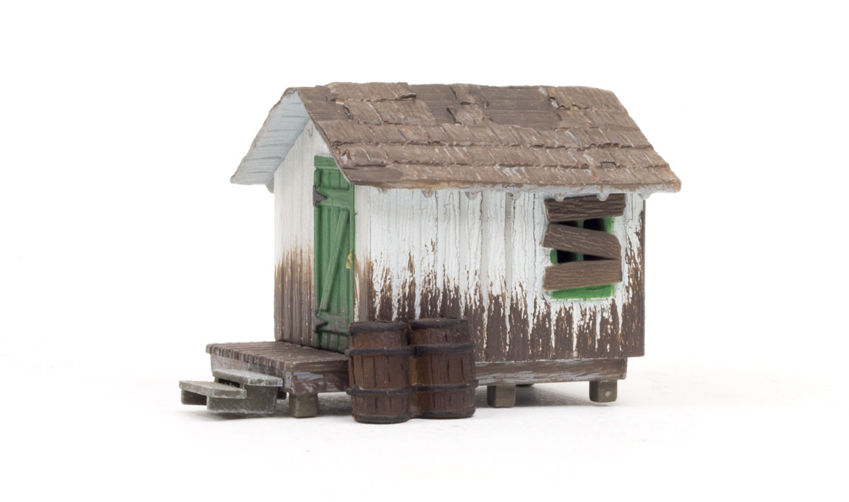 Wood Shack - HO Scale - The bright green door is a little rugged now and the wood paneled walls could use a good wash, but it is still as secure as the day it was built