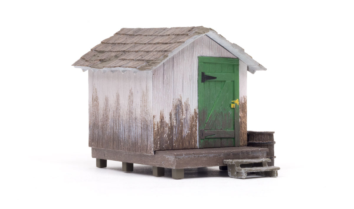 Wood Shack - O Scale  - The bright green door is a little rugged now and the wood paneled walls could use a good wash, but it is still as secure as the day it was built