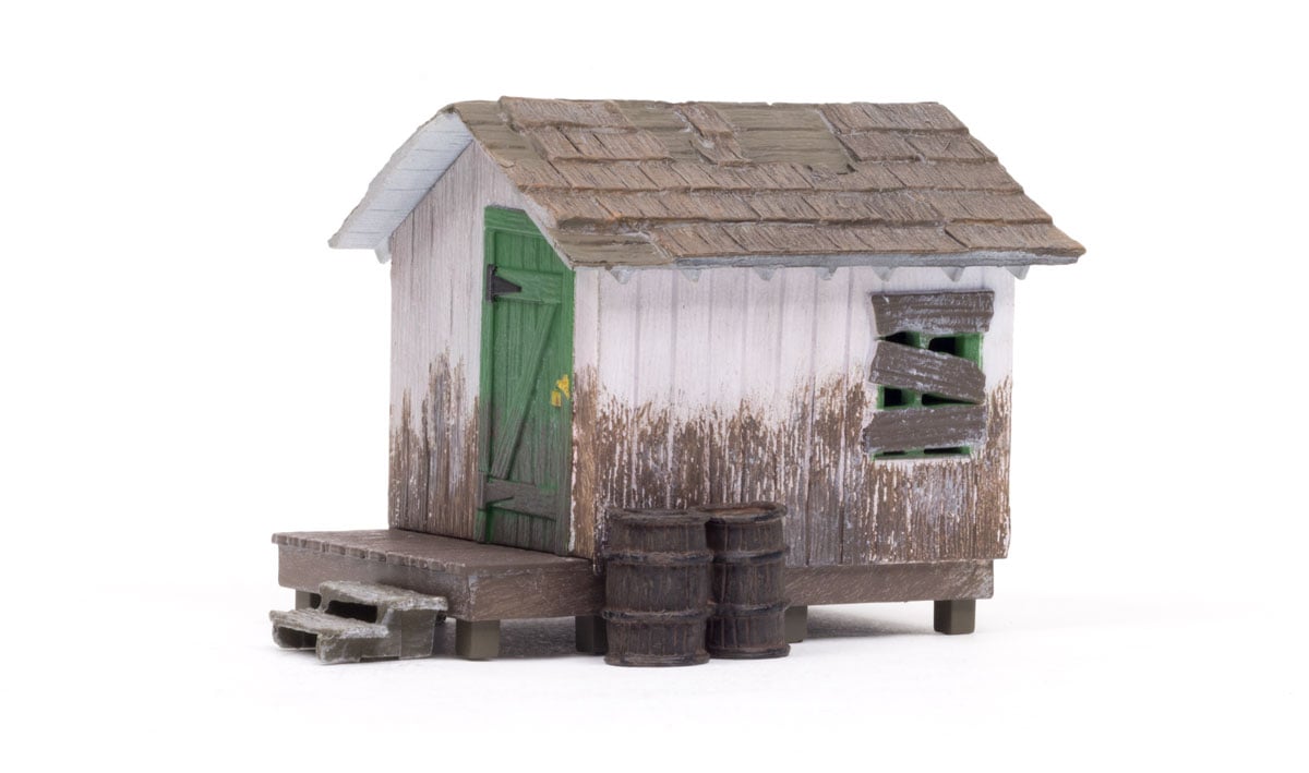 Wood Shack - O Scale  - The bright green door is a little rugged now and the wood paneled walls could use a good wash, but it is still as secure as the day it was built