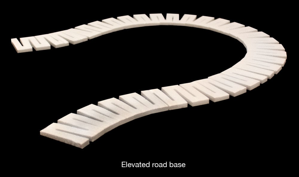 Road Riser<sup>™</sup> - Use Road Riser to establish an elevated road base and instantly set a flat surface for your roads or highways