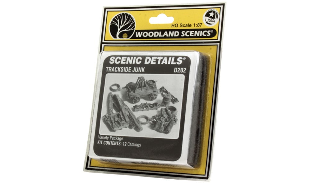 Trackside Junk HO Scale Kit - No trackside scene would be complete without the addition of piles of scrap metal, old ties, railcar pieces and more