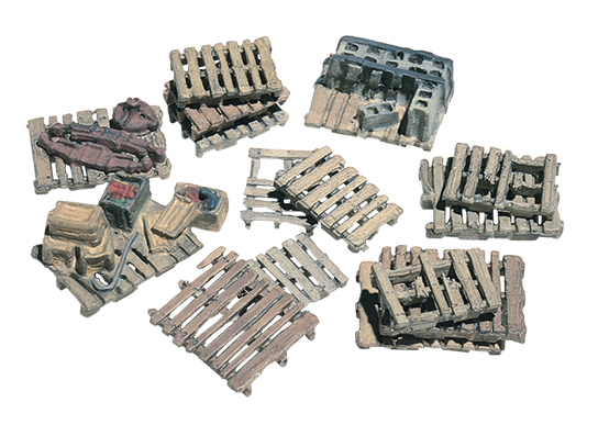 15 Assorted Skids HO Scale Kit - These skids are great for lumberyards, factory scenes and railyards, where the workmen might have unloaded some freight cars