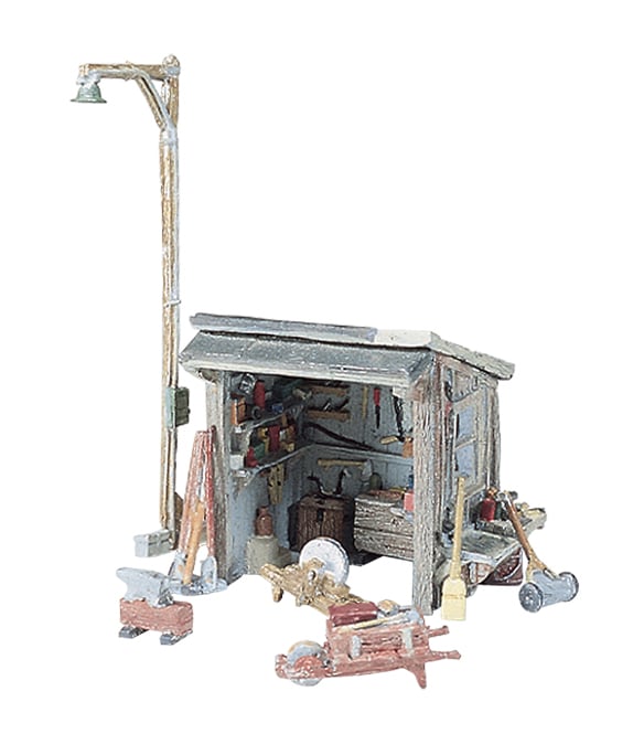 Tool Shed HO Scale Kit - This is one busy place with mowers, hand tools, a grinding wheel, carts and a broom to sweep up at the end of a busy day