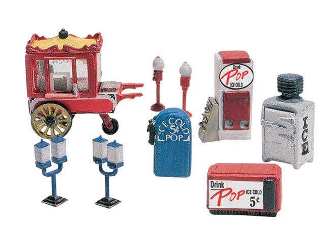 8 Vending Machines HO Scale Kit - What's yer pleasure? Vending machines dispense cold soda, gum or ice, and the cart holds favorites like hot dogs, funnel cakes and corn dogs on a hot summer day at the fair