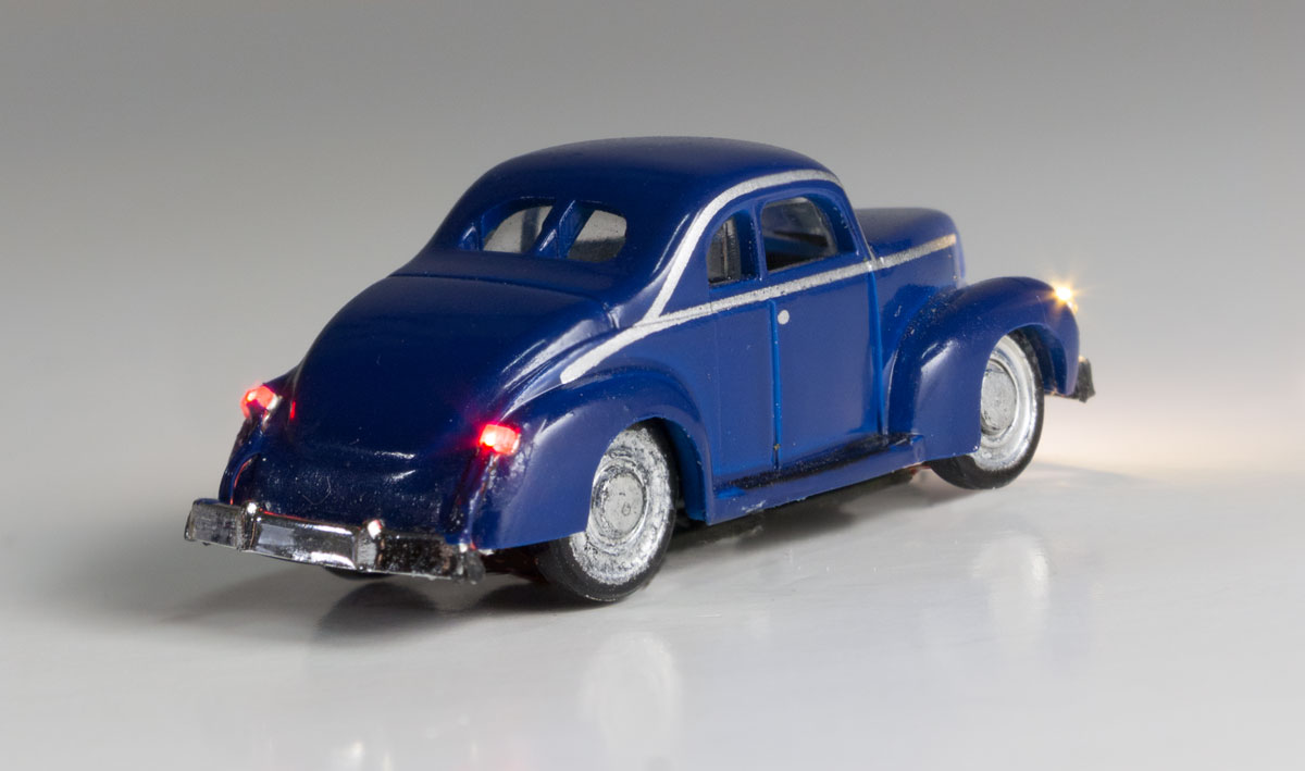 Blue Coupe - N Scale - Out for a drive? This well mannered coupe has a little bit of a wild side